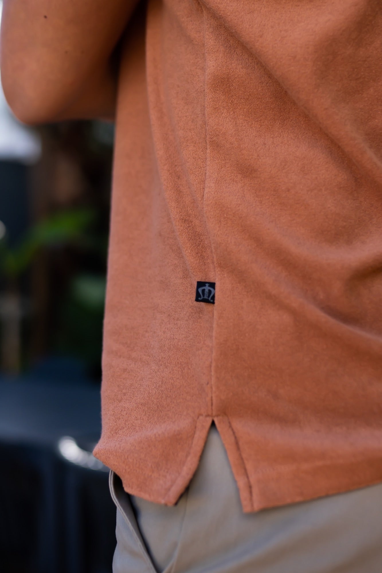 THE PALM TOWELLING POLO SHIRT IN TANGERINE